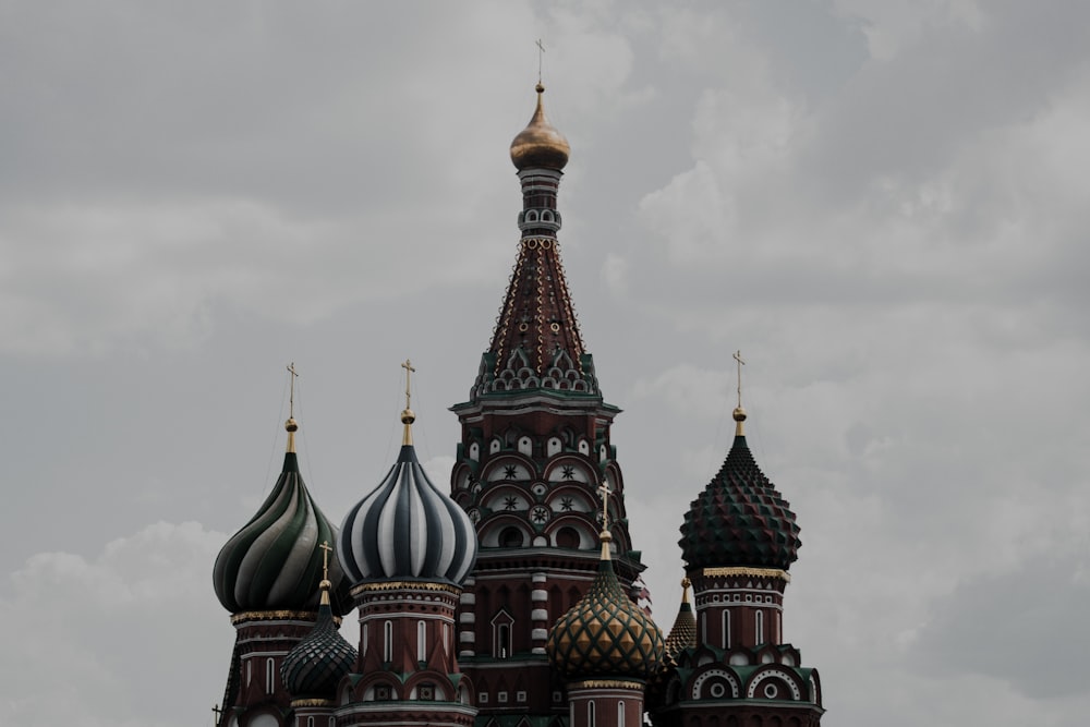 a very tall building with some very pretty domes on it