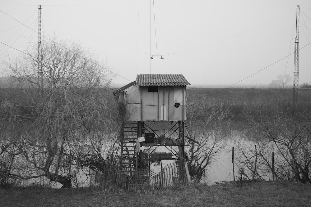 a black and white photo of a water tower