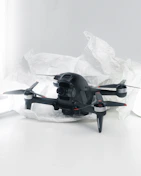 Compact FPV camera and video transmitter setup with antenna on a drone