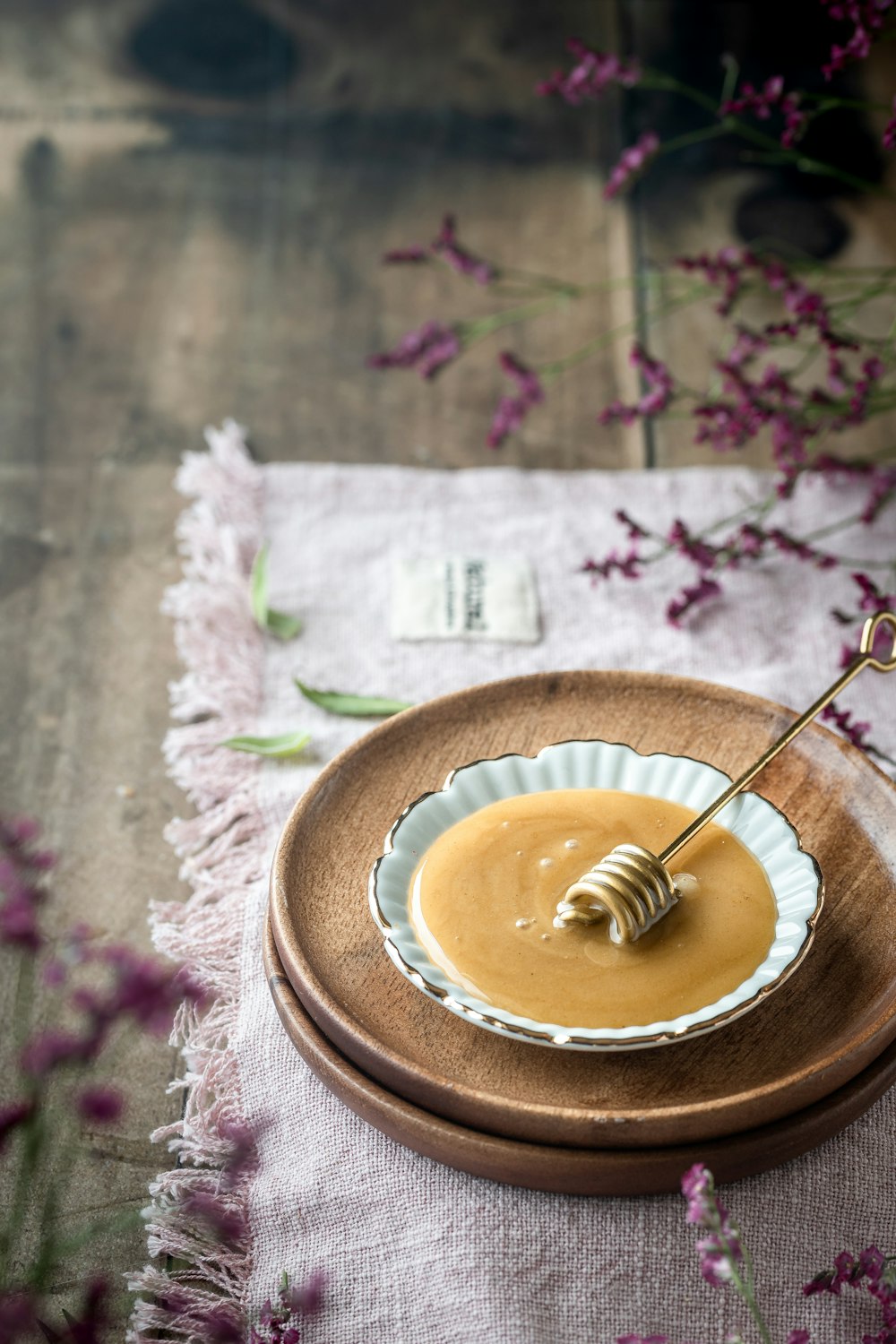 a plate with a honey dip on it