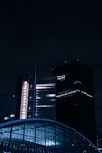 a very tall building sitting next to a very tall building
