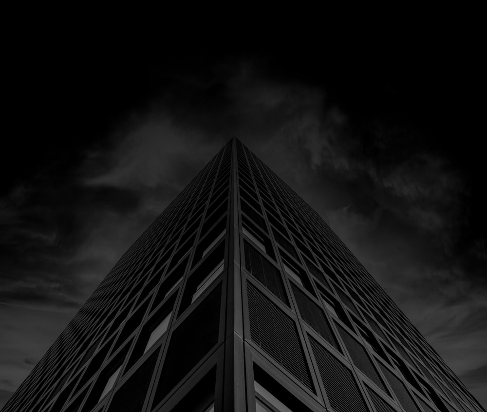 a black and white photo of a tall building