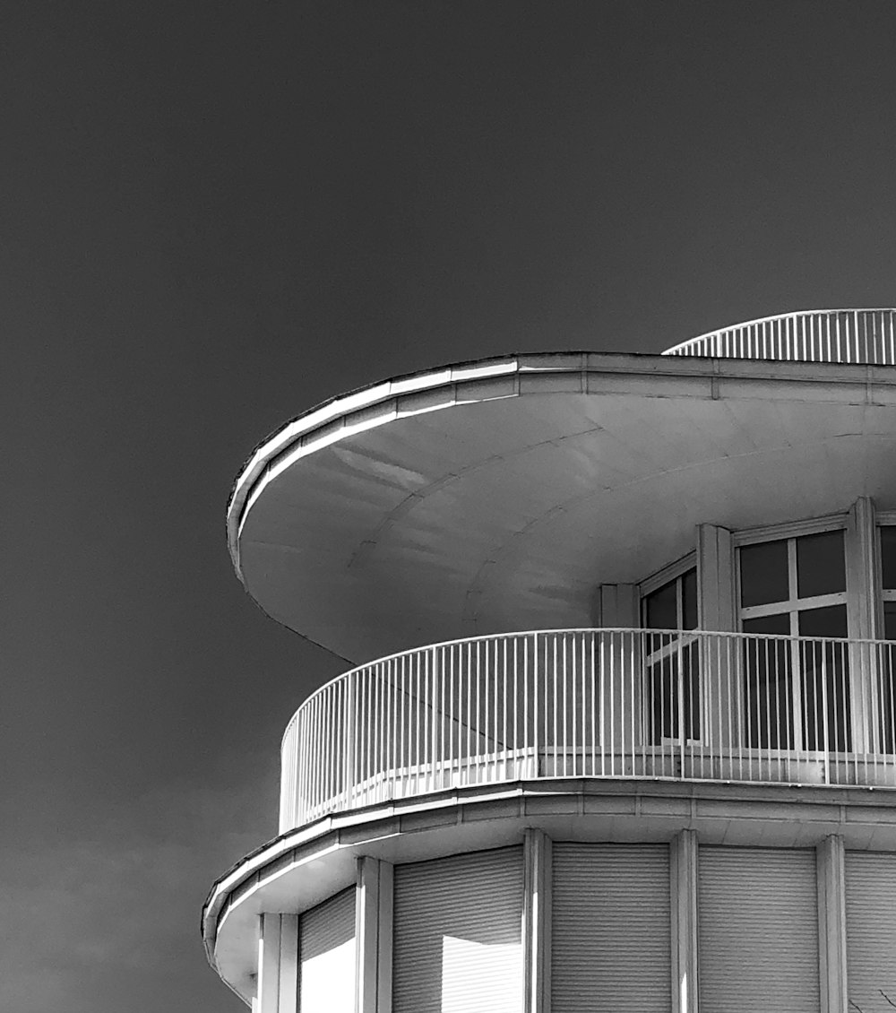 a black and white photo of a round building