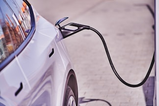 an electric car plugged into a charging station