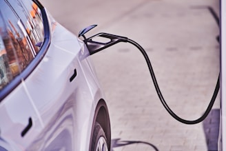 an electric car plugged into a charging station