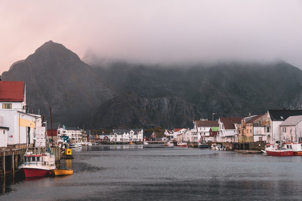 a body of water with a mountain in the background