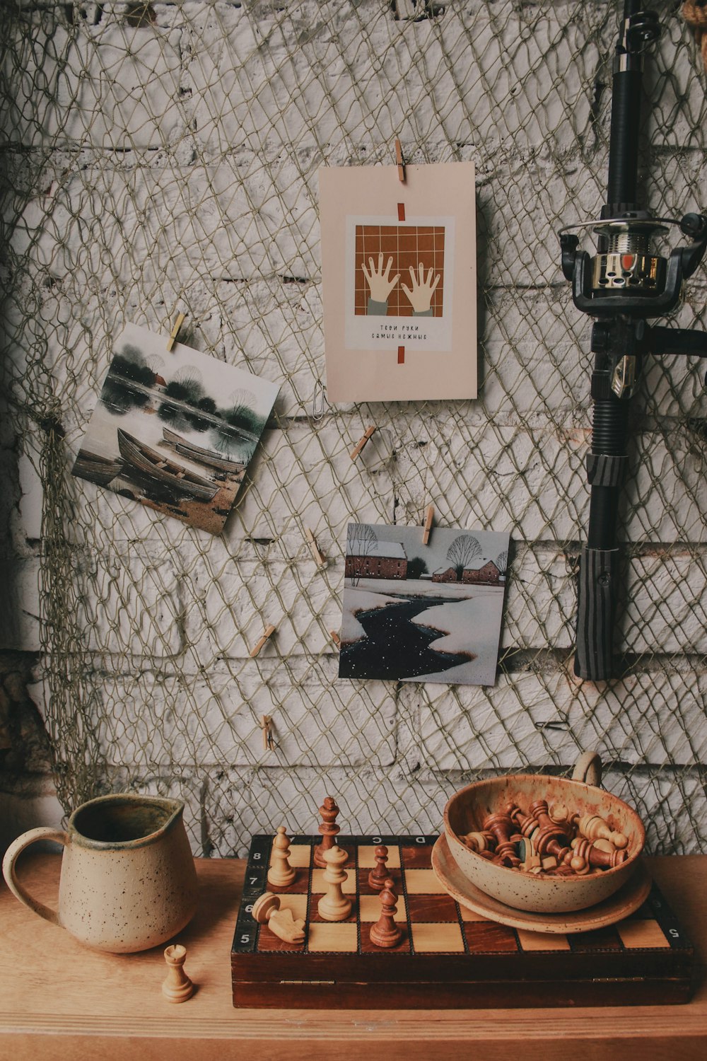 a wooden table topped with a bowl of food