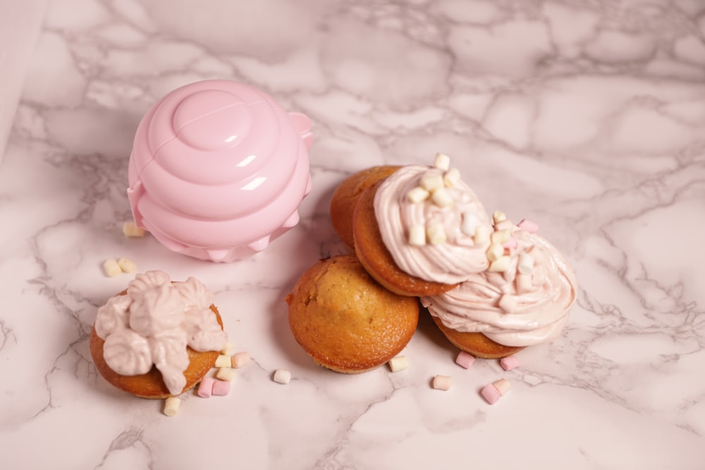 a close up of some cupcakes on a table