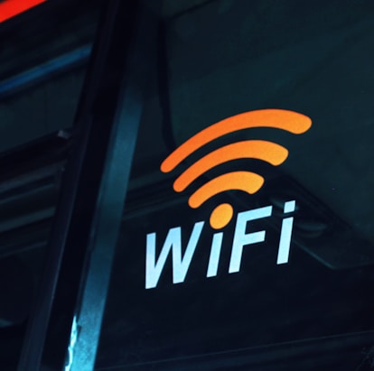 a close up of the wifi logo on the side of a bus