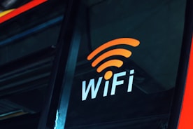 a close up of the wifi logo on the side of a bus