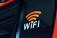 a close up of the wifi logo on the side of a bus