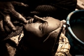 An artist carefully creating a 3D cast using premium materials.