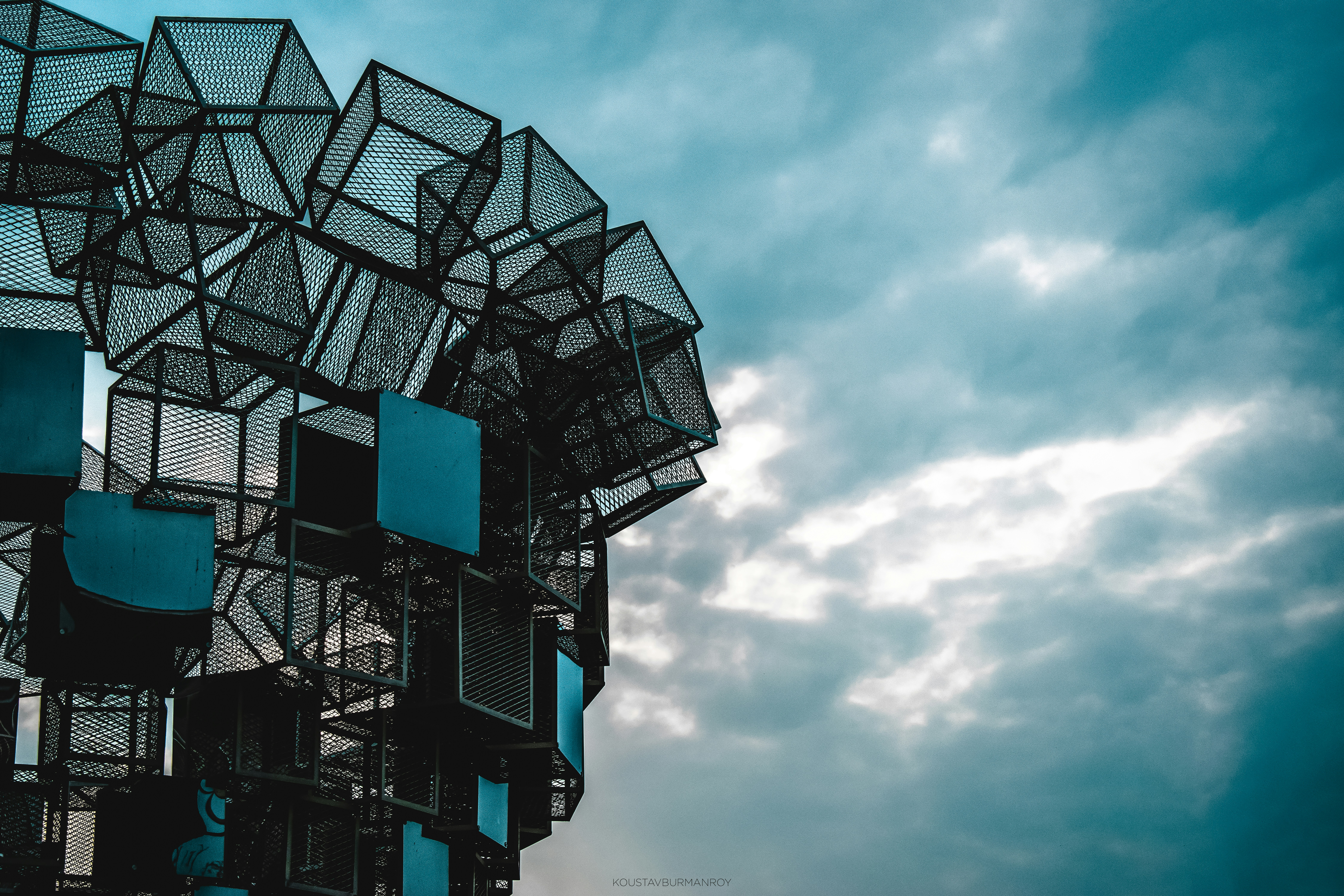 a very tall structure with lots of windows on top of it