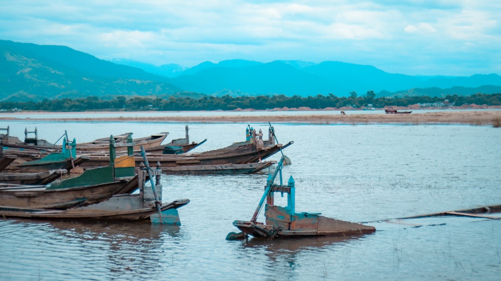 a bunch of boats that are sitting in the water