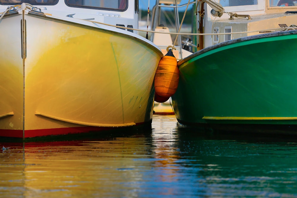 a couple of boats that are sitting in the water