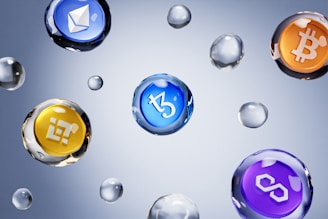 a bunch of different colored bubbles with a bitcoin on them