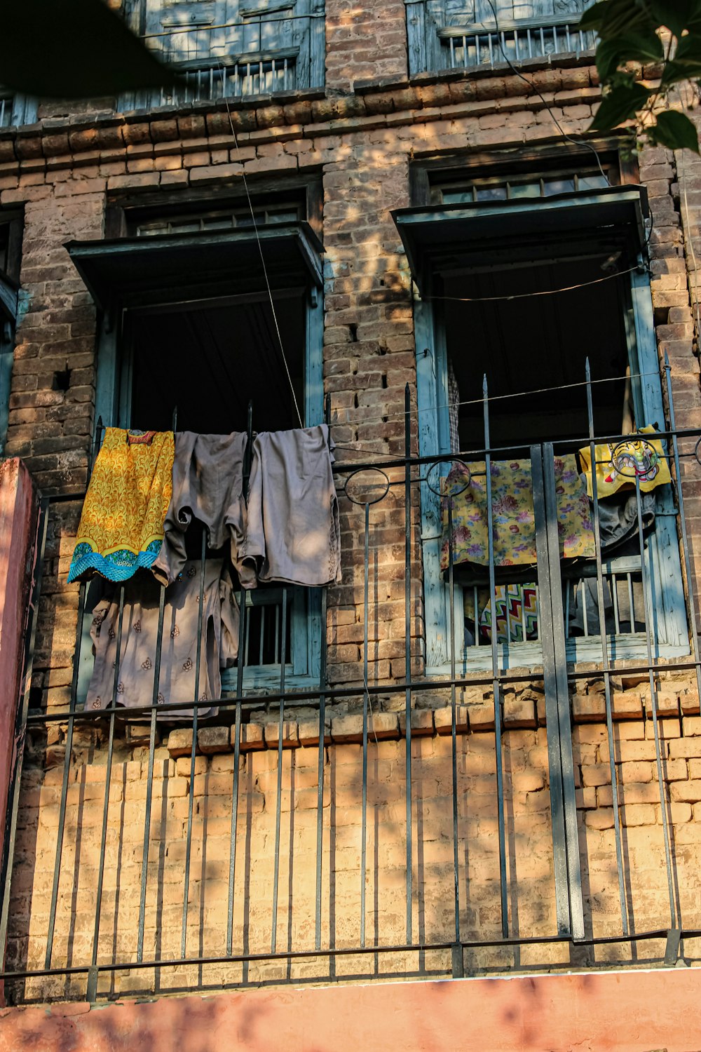 clothes hanging out to dry on a balcony