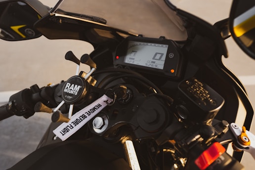 a close up of a motorcycle with a speedometer