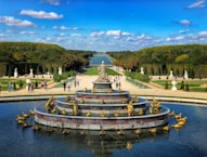 a view of a fountain in the middle of a park