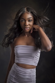 a woman with long hair posing for a picture