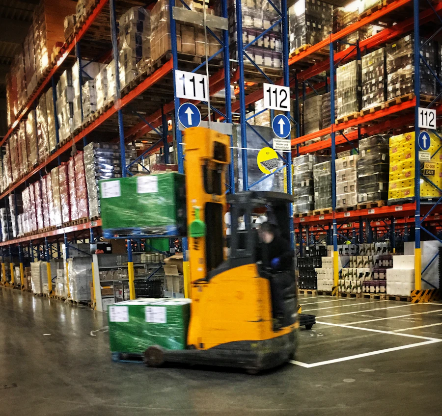 Forklift moving pallets inside a European warehouse