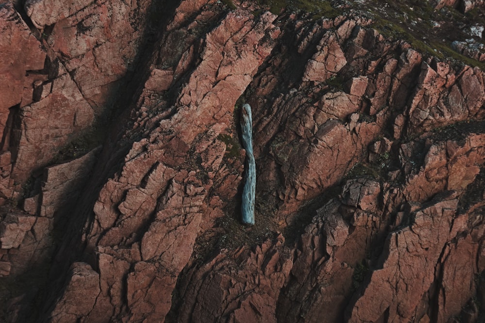 an aerial view of a long piece of rock
