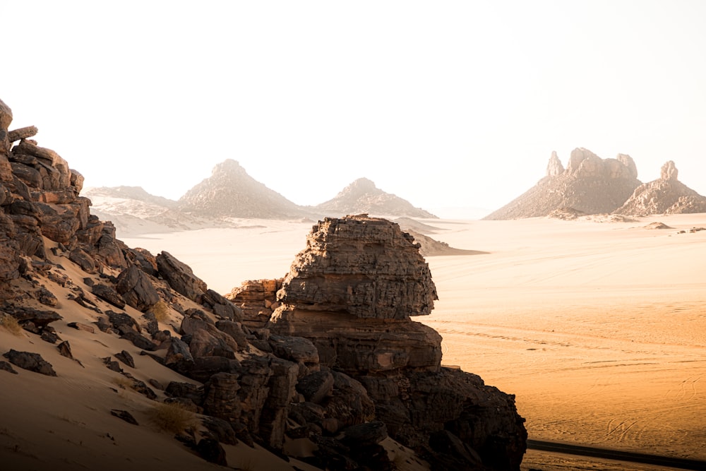 a rocky outcropping in the middle of a desert