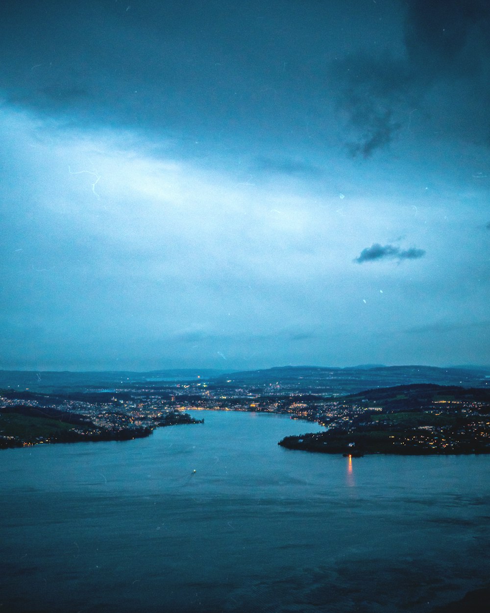 a view of a body of water at night