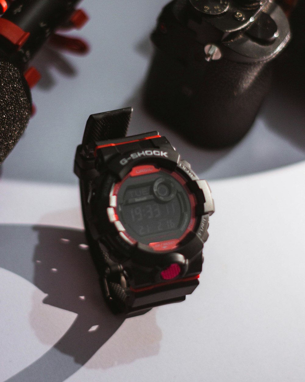 a close up of a watch on a table