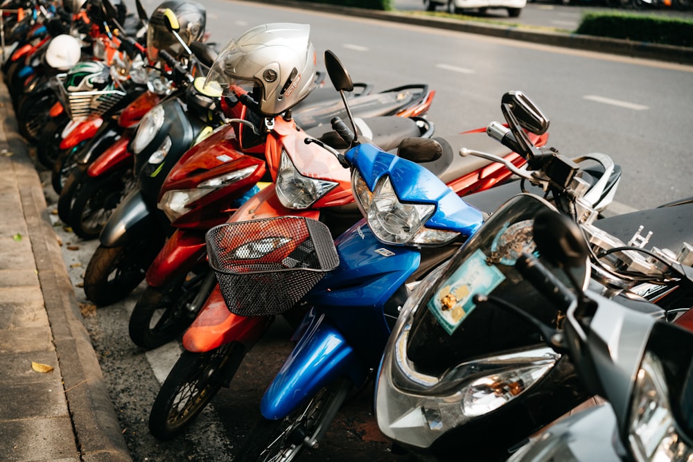 Motorcycles parked on a road. Some states allow motorcyclists to park on the side of the road.