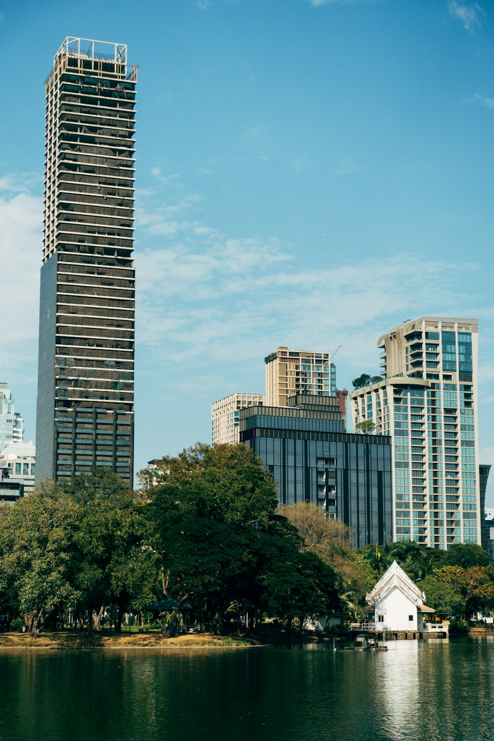 a body of water surrounded by tall buildings