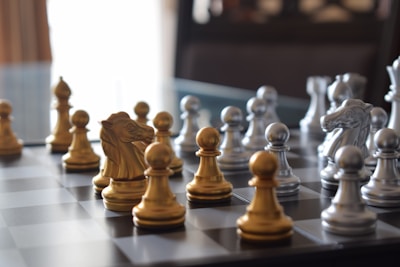 a chess board with a bunch of chess pieces on it