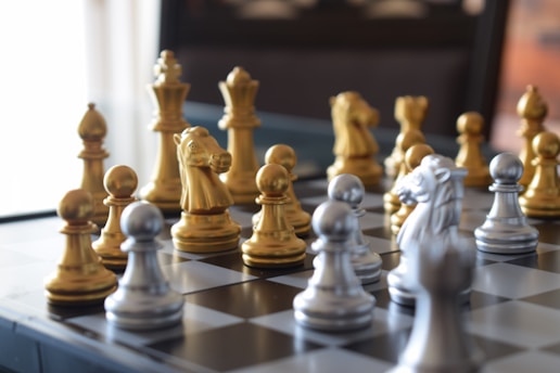 a chess board with a bunch of chess pieces on it