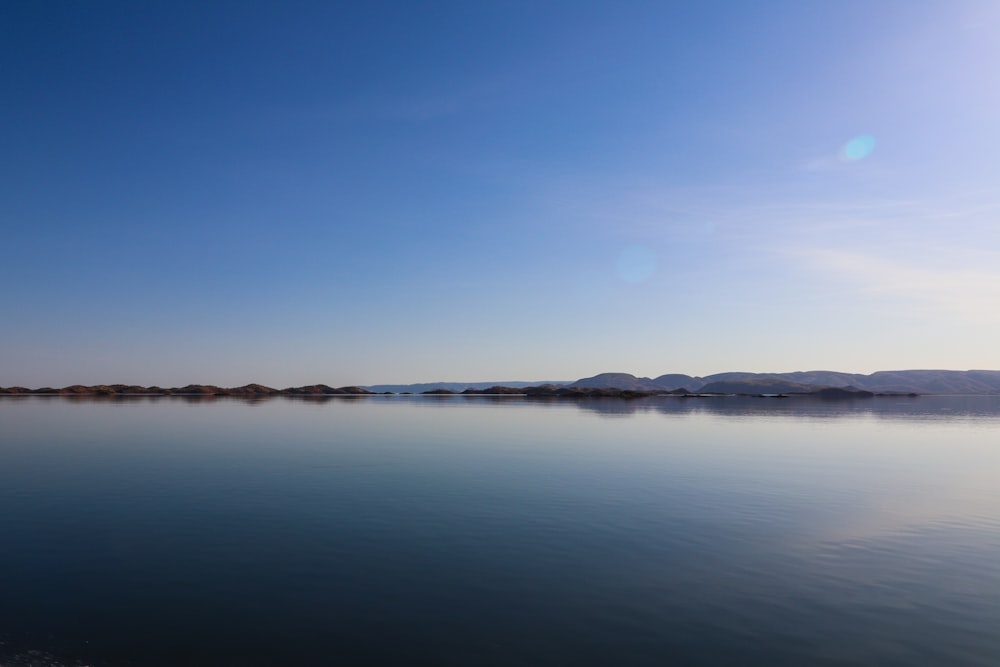 a large body of water surrounded by mountains