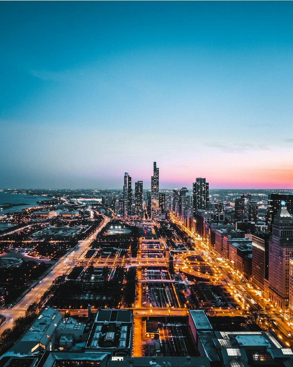 an aerial view of a city at night