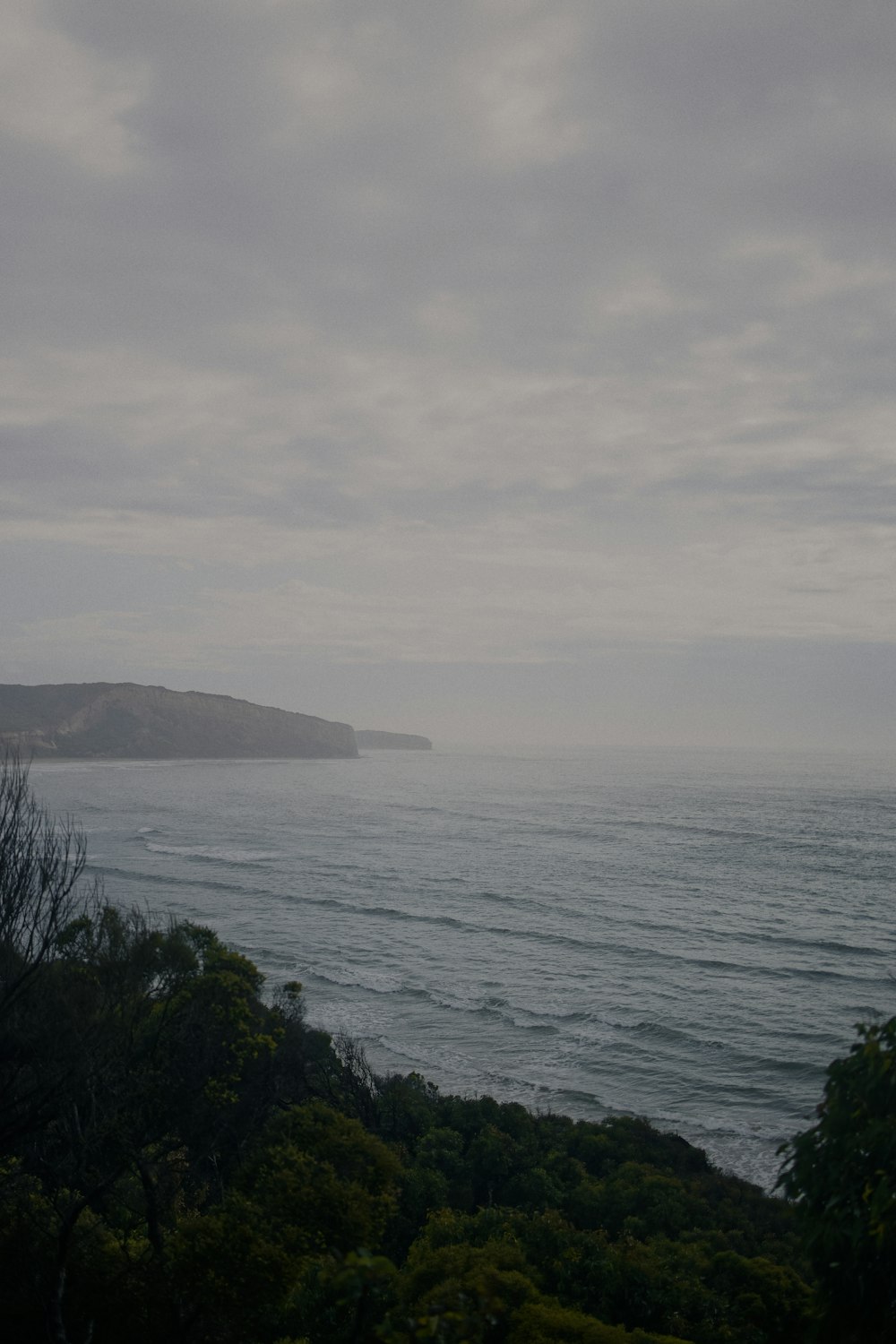 a view of a body of water from a hill