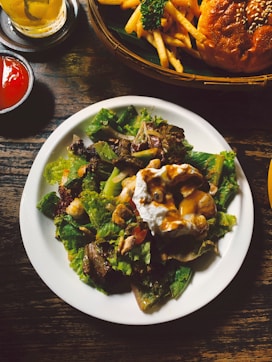 a plate of food on a wooden table