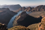 a view of a mountain range with a river running through it