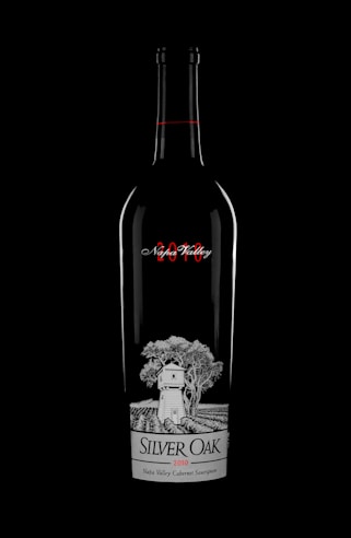 a bottle of silver oak wine on a black background