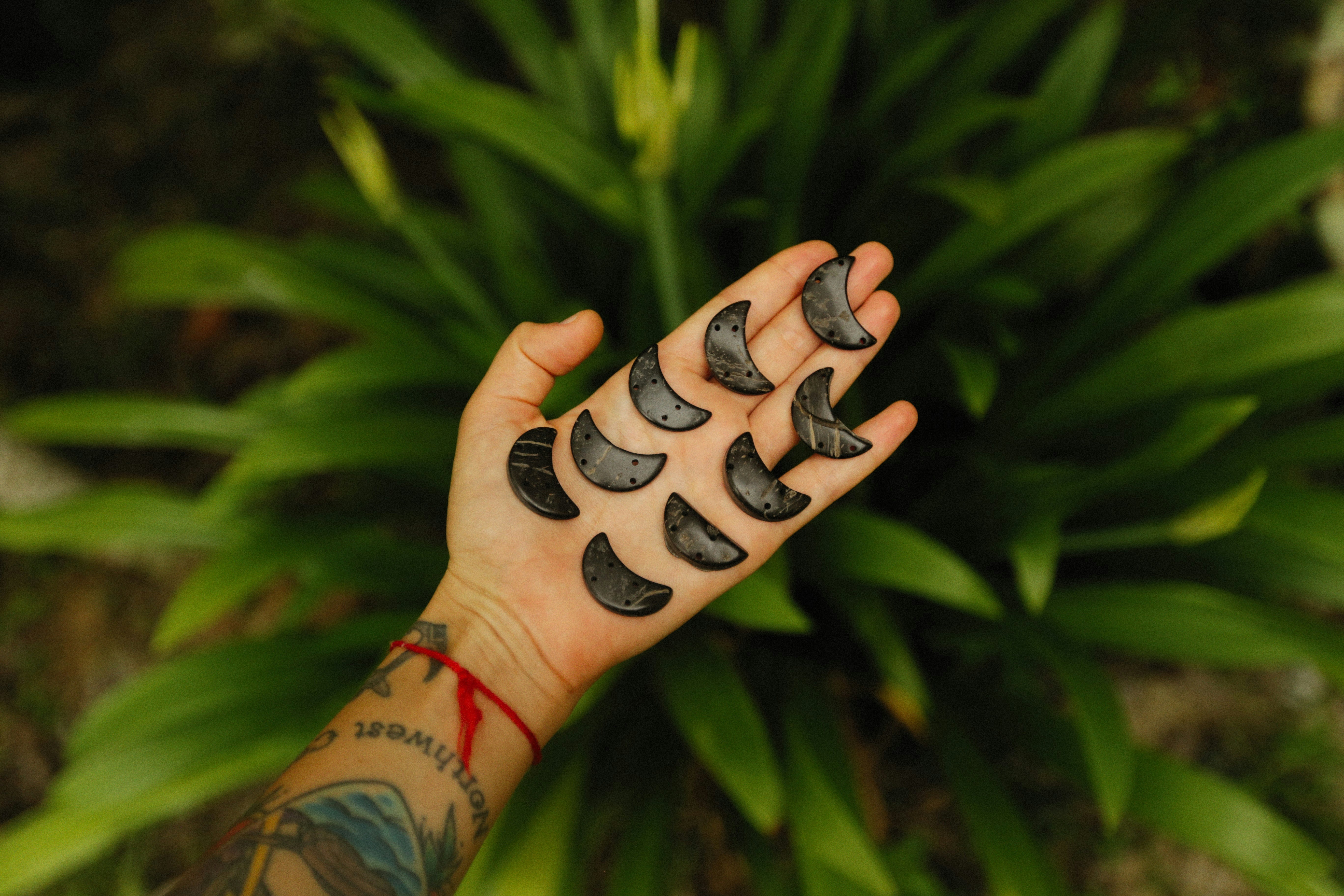 a person's hand with a tattoo on it