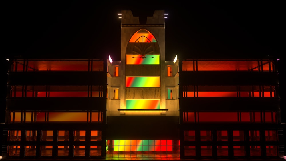 a tall building with a multicolored light on it's side