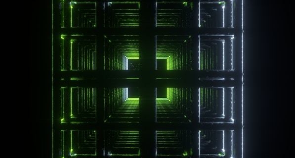 a green and black background with squares and lines