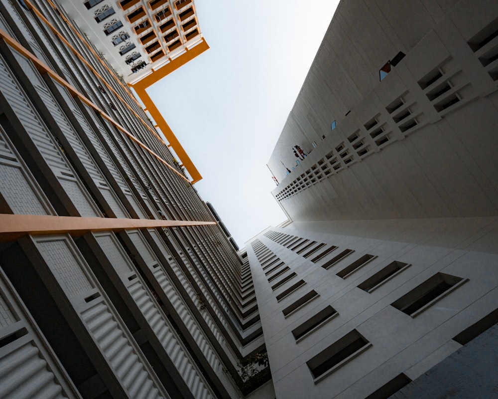 looking up at a tall building from the ground