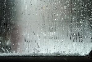 a window with rain drops on it