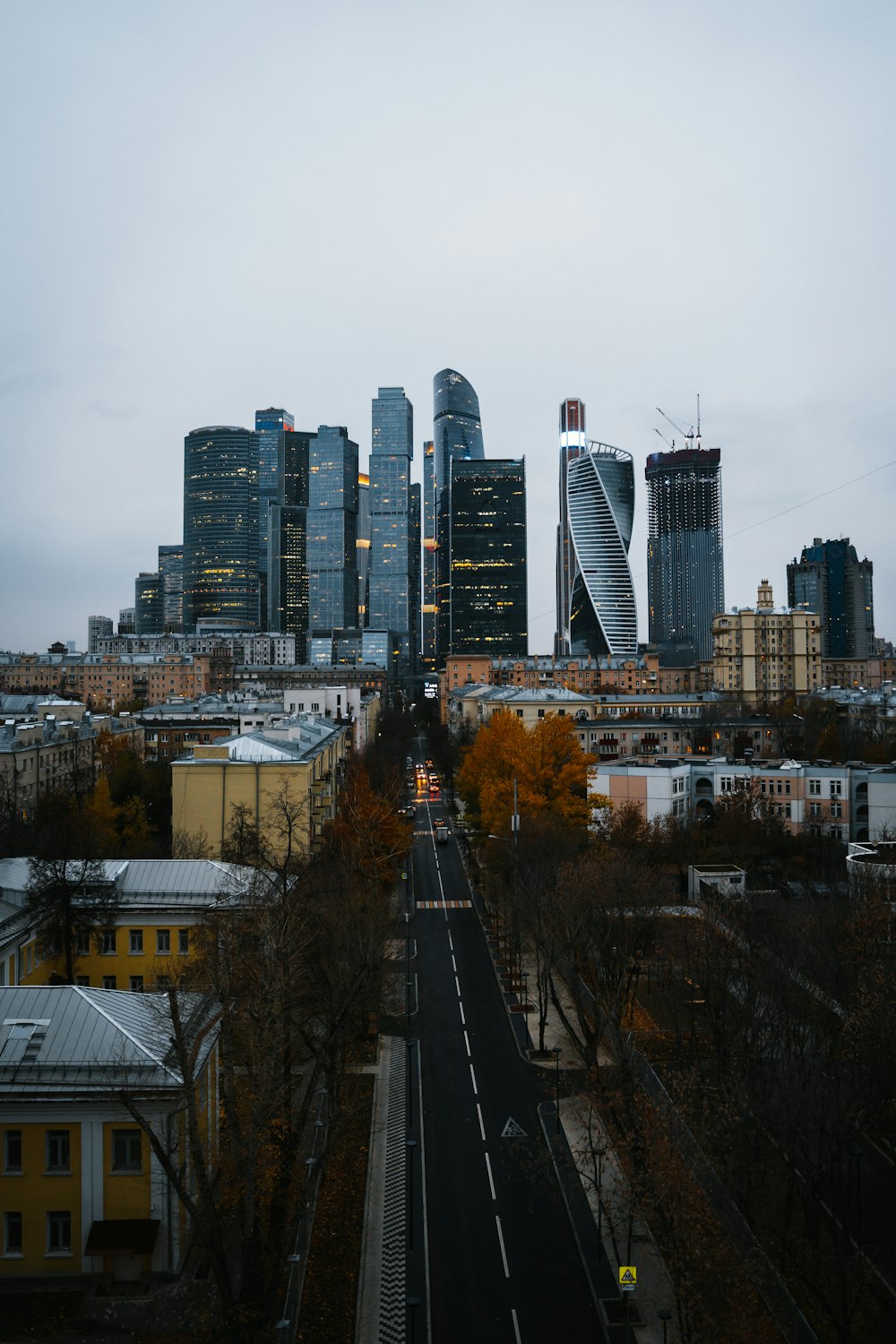 a view of a city with tall buildings