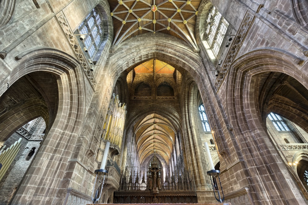the interior of a large cathedral with high vaulted ceilings