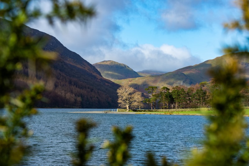 Small beach at the head of Buttermere with fells beyond