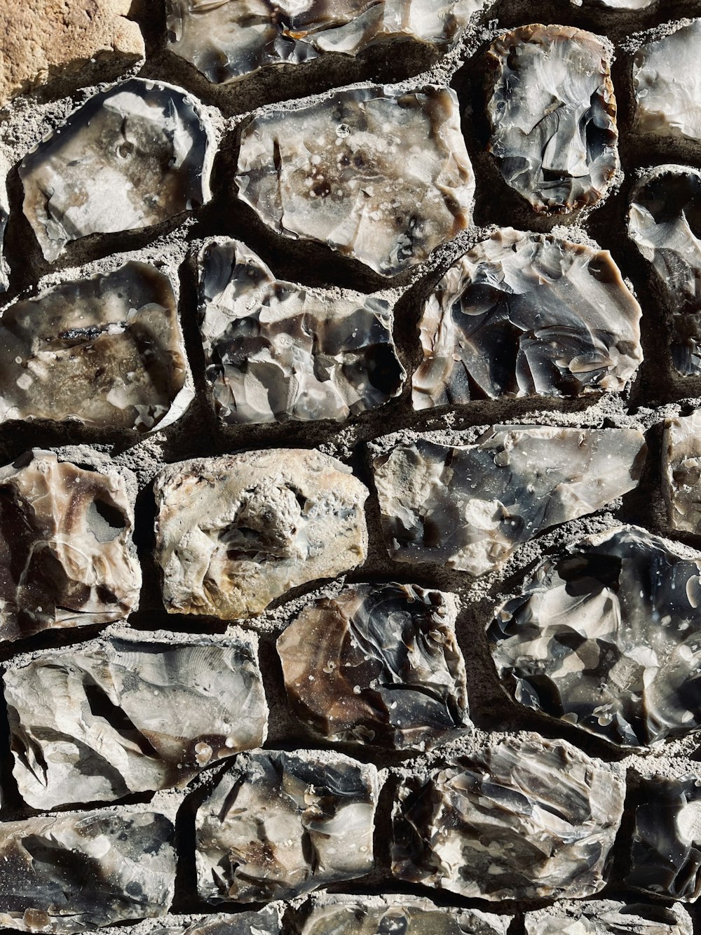 a close up of a wall made of rocks