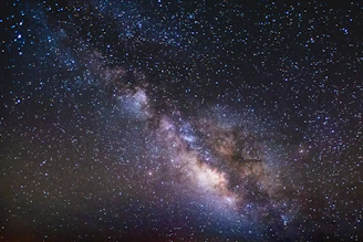 the night sky is filled with stars and the milky