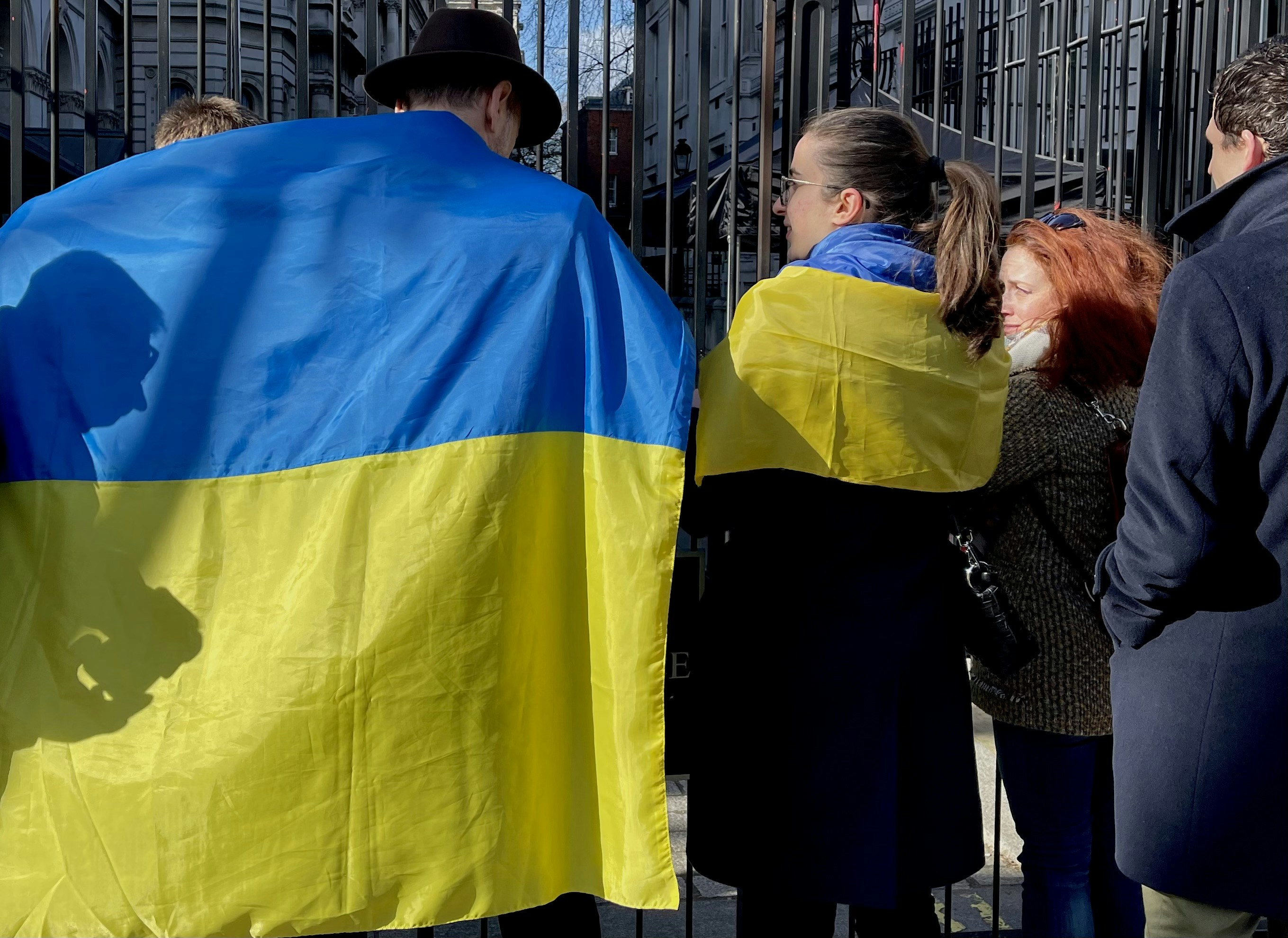 a group of people standing next to each other